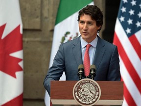 Prime Minister Justin Trudeau speaks at the end of the 10th North American Leaders Summit at the National Palace in Mexico City on January 10, 2023.
