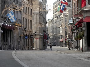 A street in Old Montreal is nearly empty as Quebec begins a new COVID-19 lockdown, January 10, 2021.
