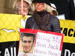 Sally Lane, the mother of British-Canadian "Jihadi Jack" Letts, demonstrates outside the Prime Minister's Office in Ottawa on May 19, 2022, calling for the repatriation of her son and other captured ISIL supporters detained in Syria.