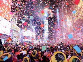 Confetti flies around the countdown clock during the first public New Year's event at Times Square, in the Manhattan borough of New York City, New York, U.S., January 1, 2023. A little after 10 p.m. about eight blocks from Times Square — just outside of the high-security zone where revellers are screened for weapons — a man attacked three police officers with a machete.