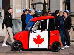 Stronach International unveils its two-seater micro-mobility vehicle in Ottawa on Nov. 2, 2022.