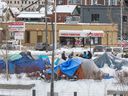A homeless encampment in Kitchener, Ontario at the corner of Victoria Street and Weber Street, Monday January 31, 2023,   