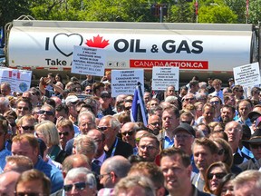Several thousand pro-pipeline protesters rally at Calgary's Stampede Park in a file photo from June 11, 2019.
