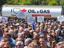 Several thousand pro-pipeline protesters rally at Calgary's Stampede Park in a file photo from June 11, 2019. A briefing document for the Trudeau government's 