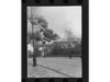 The photographer, Zbigniew Leszek Grzywaczewski, who took photos during the Warsaw Ghetto Uprising, describes this image showing smoke billowing from a building as “Nalewki Street, by the Krasiński Garden.”