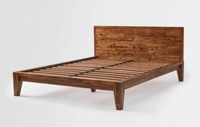 Wooden bed frame.