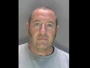 This is an undated handout photo issued by Hertfordshire Police of serving Metropolitan Police officer David Carrick. A London police officer on Monday, Jan, 16, 2023 admitted multiple counts of rape and sexual assaults on a dozen women over almost two decades. David Carrick, 48, pleaded guilty to 49 offenses, including some 20 counts of rape as well as assault, attempted rape and false imprisonment. (Hertfordshire Police via AP)