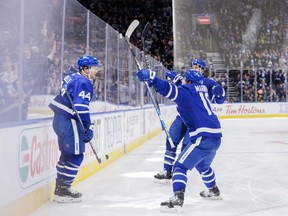 Toronto Maple Leafs defenceman Morgan Rielly (44) celebrates his goal with teammates Mitchell Marner (16) and defenceman TJ Brodie (78) during second period NHL action against the Washington Capitals in Toronto on Sunday, Jan. 29, 2023.