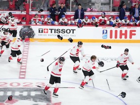 Team Canada celebrates winning the gold medal over Czechia during overtime of the IIHF World Junior Hockey Championship gold medal game in Halifax on January 5, 2023.