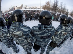 FILE -- Police block a protest against the jailing of opposition leader Alexei Navalny in Yekaterinburg, Russia, Saturday, Jan. 23, 2021. Transparency International's 2022 Corruption Perceptions Index, which measures the perception of public sector corruption according to experts and businesspeople, reported Tuesday that governments hampered by corruption lack the capacity to protect the people, while public discontent is more likely to turn into violence.
