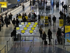 Travellers suffered another wave of canceled or delayed flights Wednesday.