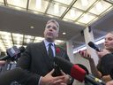 Tom Stamatakis, President of the Canadian Police Association, talks to media at City Hall in Winnipeg. 