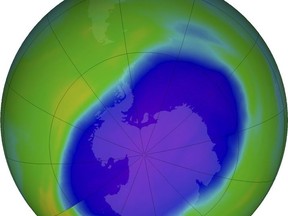FILE - In this NASA false-color image, the blue and purple shows the hole in Earth's protective ozone layer over Antarctica on Oct. 5, 2022. Earth's protective ozone layer is slowly but noticeably healing at a pace that would fully mend the hole over Antarctica in about 43 years, a new United Nations report says. (NASA via AP, File)