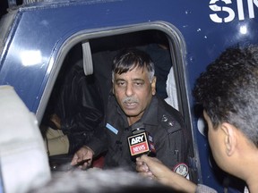 FILE - Pakistani police officer Rao Anwar responds to a reporter in Karachi, Pakistan, on Jan. 16, 2018. A Pakistani court on Monday, Jan. 23, 2023, acquitted Anwar, a retired senior police officer, and 17 others, mostly policemen still serving on the force, in the 2018 killing of a 27-year-old aspiring model. The young man was killed in what police at the time said was a raid on a militant hideout in the port city of Karachi.