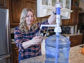 Jody Young and her family are having to use bottled water after their well became so contaminated by lead it's no longer drinkable, near Red Deer, Alta., Wednesday, Jan. 11, 2023.THE CANADIAN PRESS/Jeff McIntosh