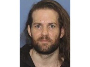 This undated photo provided by the Grants Pass Police Department shows Benjamin Obadiah Foster. Foster is accused of torturing a woman he held captive, less than two years after he was convicted in Nevada of critically injuring another woman he held captive for two weeks.(Grants Pass Police Department via AP)
