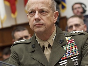 FILE - Marine Gen. John Allen, the top U.S. commander in Afghanistan, testifies on Capitol Hill in Washington on March 20, 2012. The Justice Department has dropped its probe of Allen, a retired four-star general, for his role in an alleged illegal foreign lobbying campaign on behalf of the wealthy Persian Gulf nation of Qatar, according to a statement provided by his attorney on Tuesday, Jan. 31, 2023.