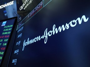 FILE - The Johnson & Johnson logo appears above a trading post on the floor of the New York Stock Exchange on July 12, 2021, in New York. A subsidiary of the health care company has agreed to pay nearly $10 million to settle allegations that it violated federal and state law by providing free products to a surgeon to induce him to use its products in procedures, prosecutors said Friday, Jan. 20, 2023. "We have fully cooperated with the government throughout its investigation of the allegations and were credited for that cooperation in the settlement," Johnson & Johnson said in a statement.