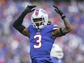 FILE - Buffalo Bills safety Damar Hamlin reacts after a play during the first half of the team's NFL football game against the Pittsburgh Steelers on Oct. 9, 2022, in Orchard Park, N.Y. Hamlin released a video on Saturday, Jan. 28, in which he's thankful for the outpouring of support and vows to pay it back, in what are the safety's first public comments since he went went into cardiac arrest and needed to be resuscitated on the field in Cincinnati on Jan. 2.