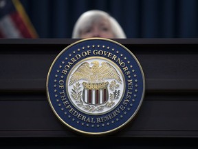 FILE - The seal of the Board of Governors of the United States Federal Reserve System is displayed on the desk as Federal Reserve Chair Janet Yellen speaks during a news conference following the Federal Open Market Committee meeting in Washington, Wednesday, Dec. 13, 2017. The Federal Reserve Board has denied a Wyoming cryptocurrency bank's application for Federal Reserve System membership, officials announced Friday, Jan. 27, 2023, a setback for the crypto industry's attempts to build acceptance in mainstream U.S. banking.