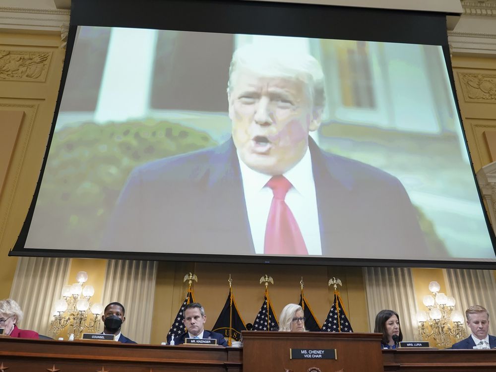 FILE – A video of former President Donald Trump speaking on Jan. 6, 2021, plays as the House select committee investigating the Jan. 6 attack on the U.S. Capitol holds a hearing at the Capitol in Washington, July 21, 2022.