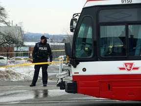 Toronto police investigate a stabbing incident on board a TTC bus in February 2022.