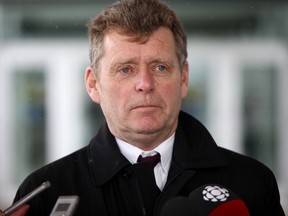 Ian Moss, CEO of Gymnastics Canada, speaks with reporters outside the courthouse in Sarnia, Ont. on Wednesday, Feb. 13, 2019. Moss and Sarah-Eve Pelletier, Canada's first sport integrity commissioner, will have the floor today in Ottawa. Moss and Pelletier are among those testifying before members of Parliament as the Standing Committee on the Status of Women continues its hearings on the safety of women and girls in sport.THE CANADIAN PRESS/Mark Spowart