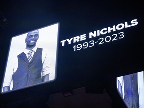 The screen at the Smoothie King Center honours Tyre Nichols before an NBA basketball game between the New Orleans Pelicans and the Washington Wizards in New Orleans, Saturday, Jan. 28, 2023. A national Indigenous organization is calling on Canadian police forces to make "fundamental changes" to end brutality against members of racialized groups in the country.