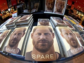 CORRECTS SLUG -- Copies of the new book by Prince Harry called "Spare" are displayed at a book store in Berlin, Germany, Tuesday, Jan. 10, 2023. Prince Harry's memoir "Spare" went on sale in bookstores on Tuesday, providing a varied portrait of the Duke of Sussex and the royal family.