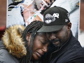 Kenyana Dixon is comforted during a rally for her brother Tyre Nichols at the National Civil Rights Museum on Monday, Jan. 16, 2023. Nichols was killed during a traffic stop with Memphis Police on Jan. 7.