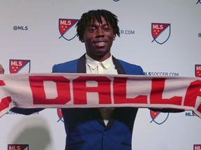 Canadian forward Adonijah Reid selected in the second round by FC Dallas poses at the MLS SuperDraft in Los Angeles on Friday, Jan. 13, 2017. Pacific FC has signed winger/forward Reid.THE CANADIAN PRESS/Neil Davidson
