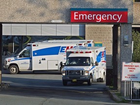 Paramedics are seen at the Dartmouth General Hospital in Dartmouth, N.S. on July 4, 2013. A new survey suggests the vast majority of Canadians have concerns about the state of the health-care system, particularly in Atlantic provinces.