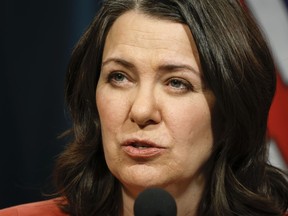 Alberta Premier Danielle Smith's office says it would be wrong if a staffer contacted Crown prosecutors about cases involving people who blockaded a U.S. border crossing at Coutts, Alta. The premier gives an update in Calgary, Tuesday, Jan. 10, 2023.