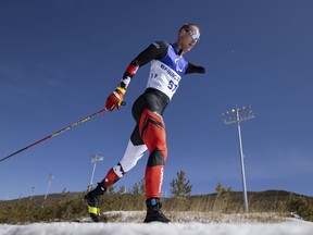 In this photo provided by Olympic Information Services, Mark Arendz, of Canada, competes in the men's Long Distance Classical Technique Standing Para Cross-Country Skiing at the Beijing Winter Paralympic Games, Zhangjiakou, China, Monday, March 7, 2022. Canada's Mark Arendz skied to a gold medal in the men's standing 10-kilometre biathlon Wednesday at the 2023 Para Nordic World Championships.