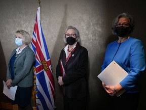 B.C. Provincial Health Officer Dr. Bonnie Henry, from left to right, Carolyn Bennett, federal minister of Mental Health and Addictions, and B.C. Minister of Mental Health and Addictions Jennifer Whiteside stand together during a news conference in Vancouver, on Monday, January 30, 2023. Decriminalization of people with small amounts of illegal drugs for their own use has become a reality in British Columbia, but substance users and researchers say the move is expected to make little immediate difference because of a toxic drug supply that is killing people.