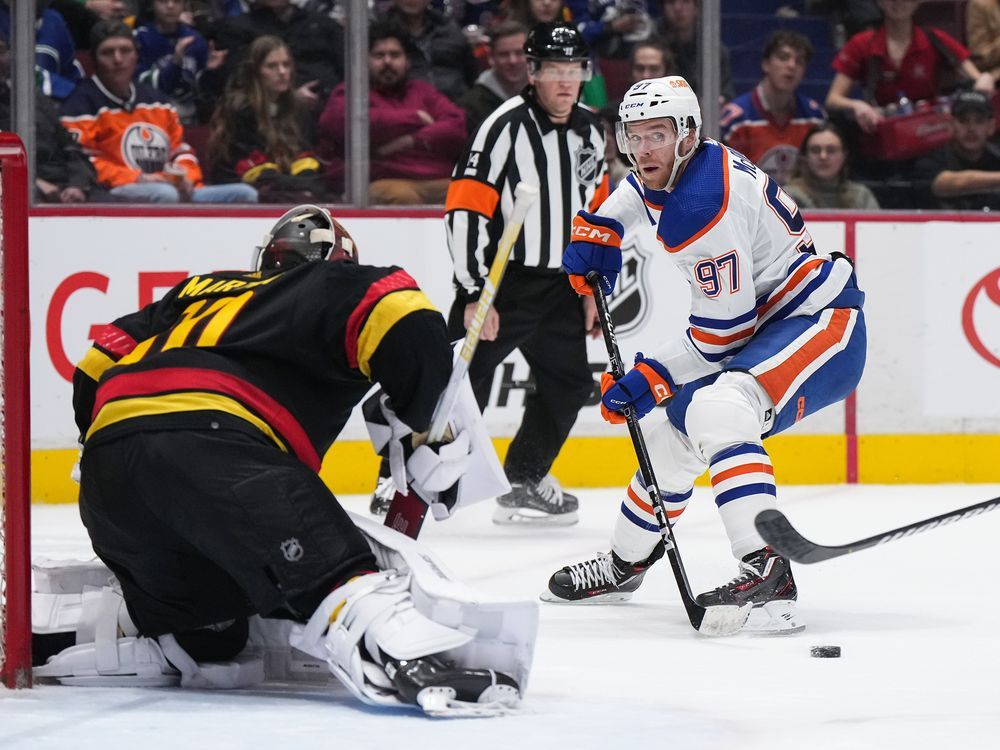 Hyman puts up four points, Oilers down Canucks 4-2 to extend win streak