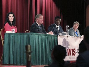 FILE - From left, Wisconsin state Supreme Court candidates Waukesha County Judge Jennifer Dorow, former Wisconsin Supreme Court Justice Dan Kelly, Dane County Judge Everett Mitchell, and Milwaukee County Judge Janet Protasiewicz participate in a candidate forum at Monona Terrace in Madison, Wis. Monday, Jan. 9, 2023. The winner of the April 4 election will determine whether the court remains under control of conservative justices or flips to a liberal majority.