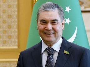 Former Turkmen President, People's Council (Khalk Maslahaty) Chairman Gurbanguly Berdymukhamedov smiles during his meeting with Russian Prime Minister Mikhail Mishustin in Ashgabat, on Friday, Jan. 20, 2023. Turkmenistan's President Serdar Berdymukhamedov has appointed his father to lead the country's newly formed supreme representative body, further expanding his clout in the gas-rich Central Asian nation. The president also signed a law granting his father the title of the "national leader of the Turkmen people."