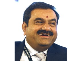 FILE- Adani Group Chairman Gautam Adani attends the 'Invest Karnataka 2016 - Global Investors Meet' in Bangalore, India, Feb. 3, 2016. India's Adani Group launched a share offering for retail investors Friday, Jan. 27, 2023, as it mulled taking legal action against U.S.-based short-selling firm Hindenburg Research for allegations of stock market manipulation and accounting fraud that caused heavy selling of its stocks this week.