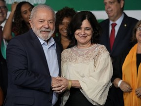 Brazilian President-elect Luiz Inacio Lula da Silva stands with his Health Minister Nisia Trindade during an event where he announced those who will lead ministries in his upcoming government in Brasilia, Brazil, Thursday, Dec. 22, 2022. Lula will be sworn-in on Jan. 1, 2023.