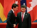 Prime Minister Justin Trudeau greets Chinese President Xi Jinping during a G20 Summit in Hangzhou, China, in 2016. Beijing's influence in Canada took off after the Trudeau Liberals came to power in 2015, writes Terry Glavin.