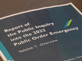 A copy of Justice Paul Rouleau's report on the Liberal government's use of the Emergencies Act, is shown in Ottawa, Friday, Feb.17, 2023.