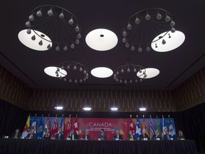 Canadian premiers listen to Prime Minister Justin Trudeau during the closing news conference at the First Ministers Meeting in Ottawa, Tuesday October 3, 2017.