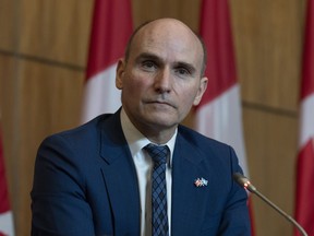 Federal Health Minister Jean-Yves Duclos listens to a question during a news conference, Friday, Jan. 20, 2023 in Ottawa.