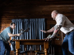 Jonathan Groff and Dave Bautista in Knock at the Cabin.