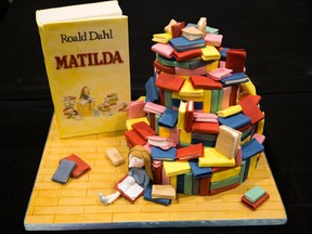A cake decorated in the style of the Roald Dahl children's book "Matilda" is displayed at the Cake and Bake show in London, Britain October 3, 2015.