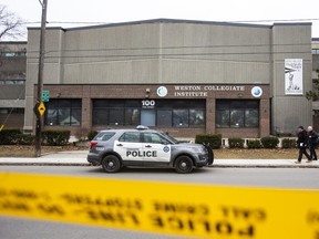 Toronto Police at Weston Collegiate Institute after a shooting on Thursday February 16, 2023. A 15-year-old student was rushed to a trauma centre in critical care.  Ernest Doroszuk/Postmedia