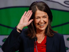 Danielle Smith waves to supporters after winning the UCP leadership in Calgary on Oct. 6, 2022.