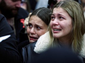 Friends and family mourn at the funeral of Rafael Ben Eliyahu, who was killed on Friday by a Palestinian terrorist, in Jerusalem, on Jan. 29.