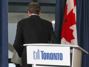 John Tory leaves after making his final speech as mayor of Toronto, on Feb. 17, 2023.